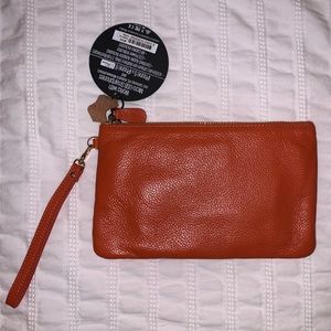 Coral phone charging wrist clutch